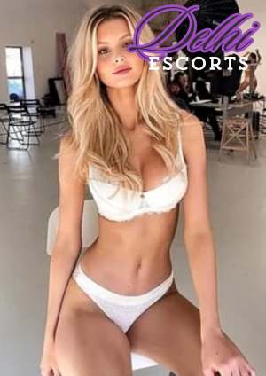 American model promoting Chandigarh escorts in white dress